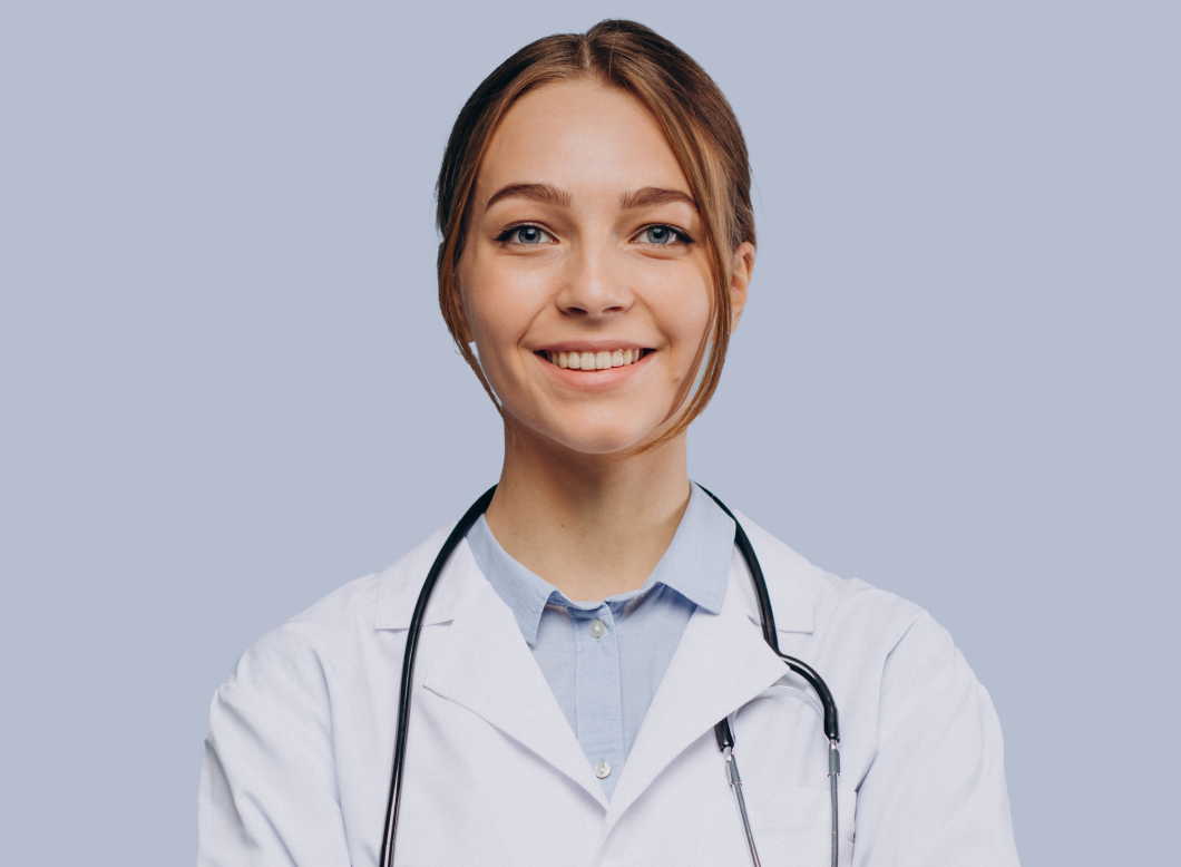 Woman doctor in white smiling
